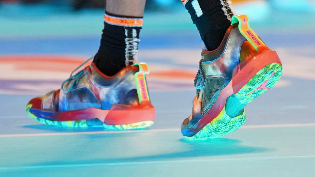 Jacob Toppin's blue and orange Air Jordan sneakers from the NBA Slam Dunk Contest.